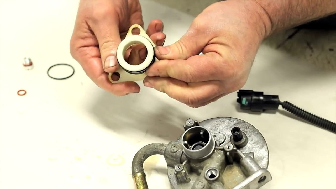 How-to replace & rebuild the diesel fuel filter head on a Duramax engine. - Diesel Truck Tutorial